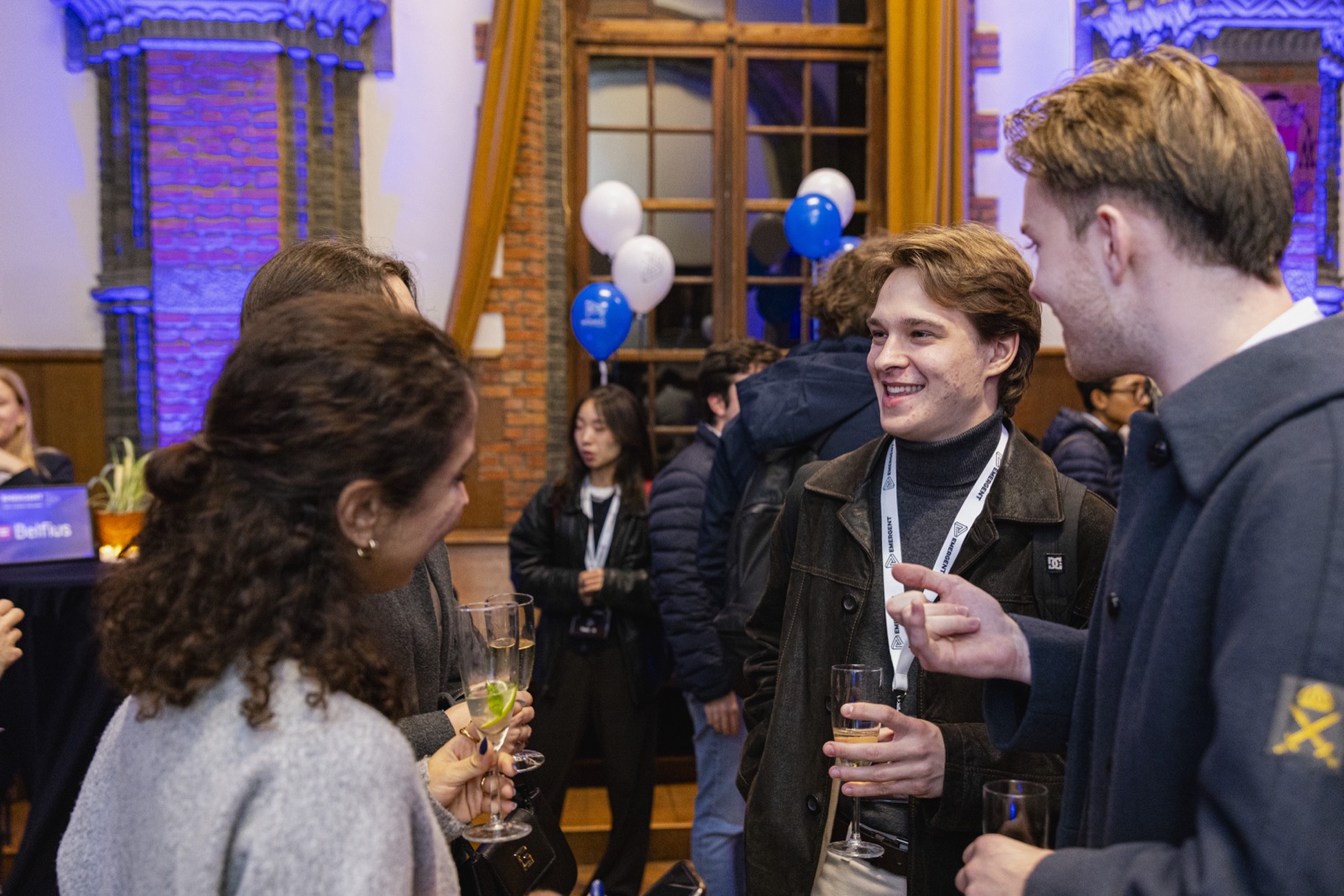 Students talking together at an Emergent event