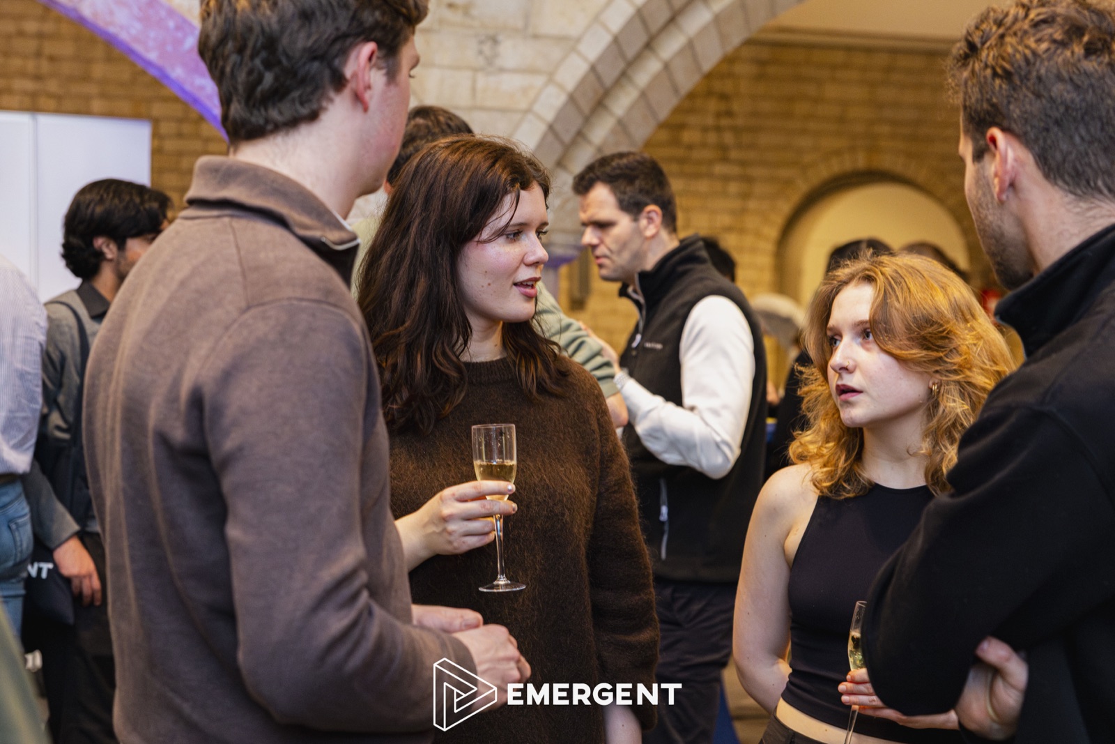 Students networking at an Emergent career night