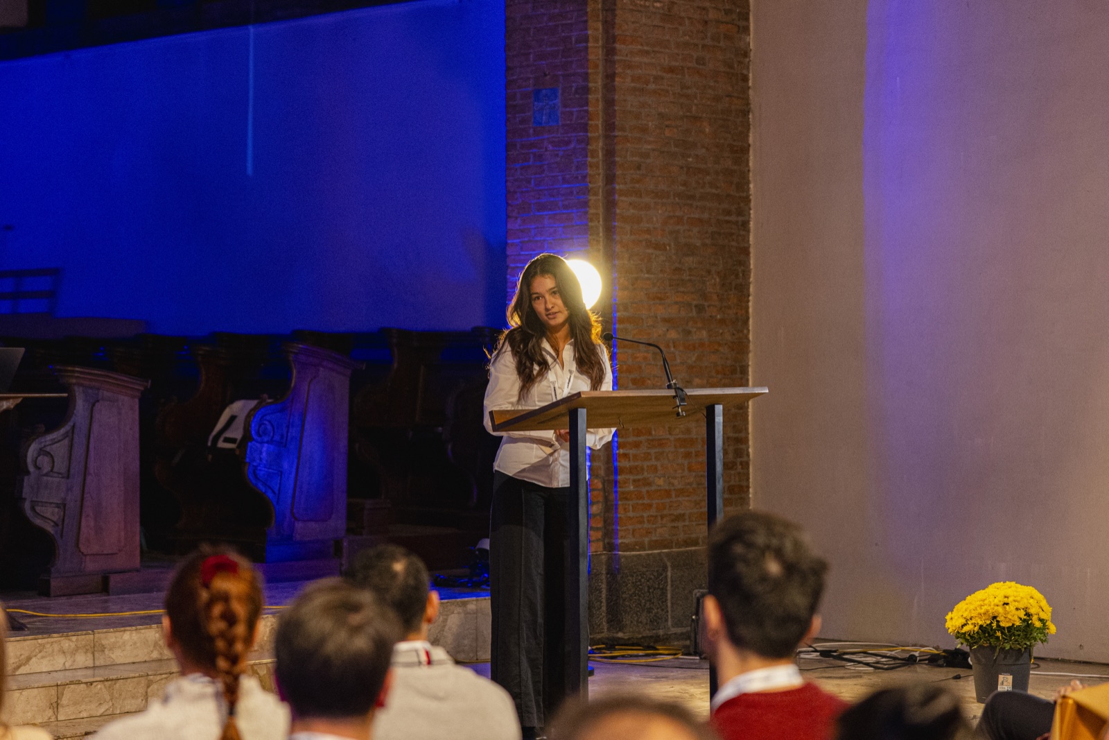 An Emergent speaker presenting on stage